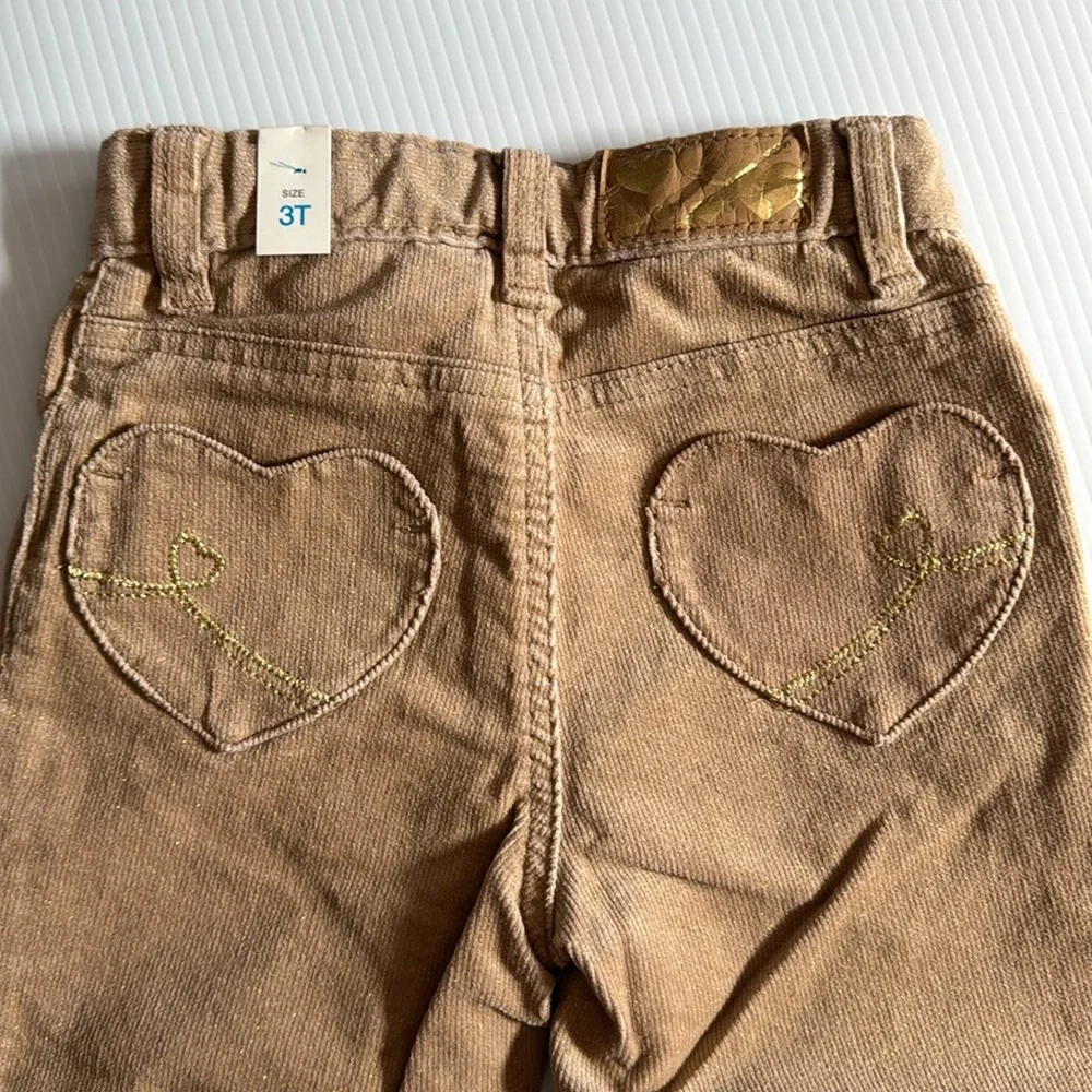 The Children’s Place light tan with gold glitter corduroy pants. Girls size 3T